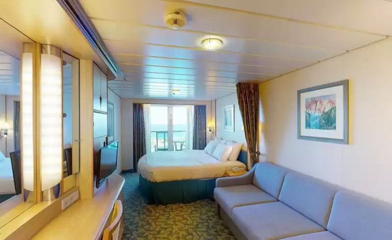 Cabine espaçosa com vista para o mar e varanda